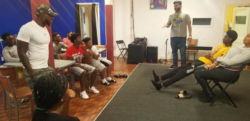 A facilitator leading a class
