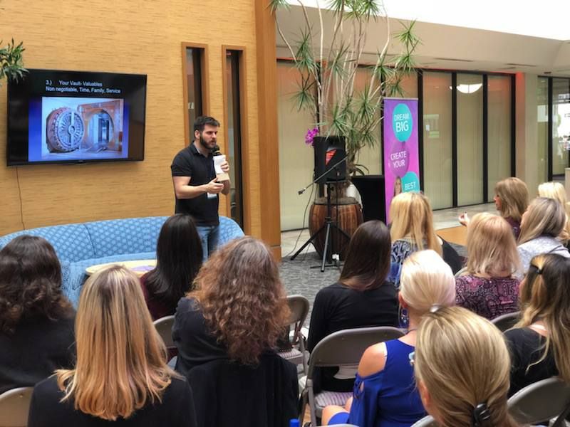 A facilitator presenting to an audience